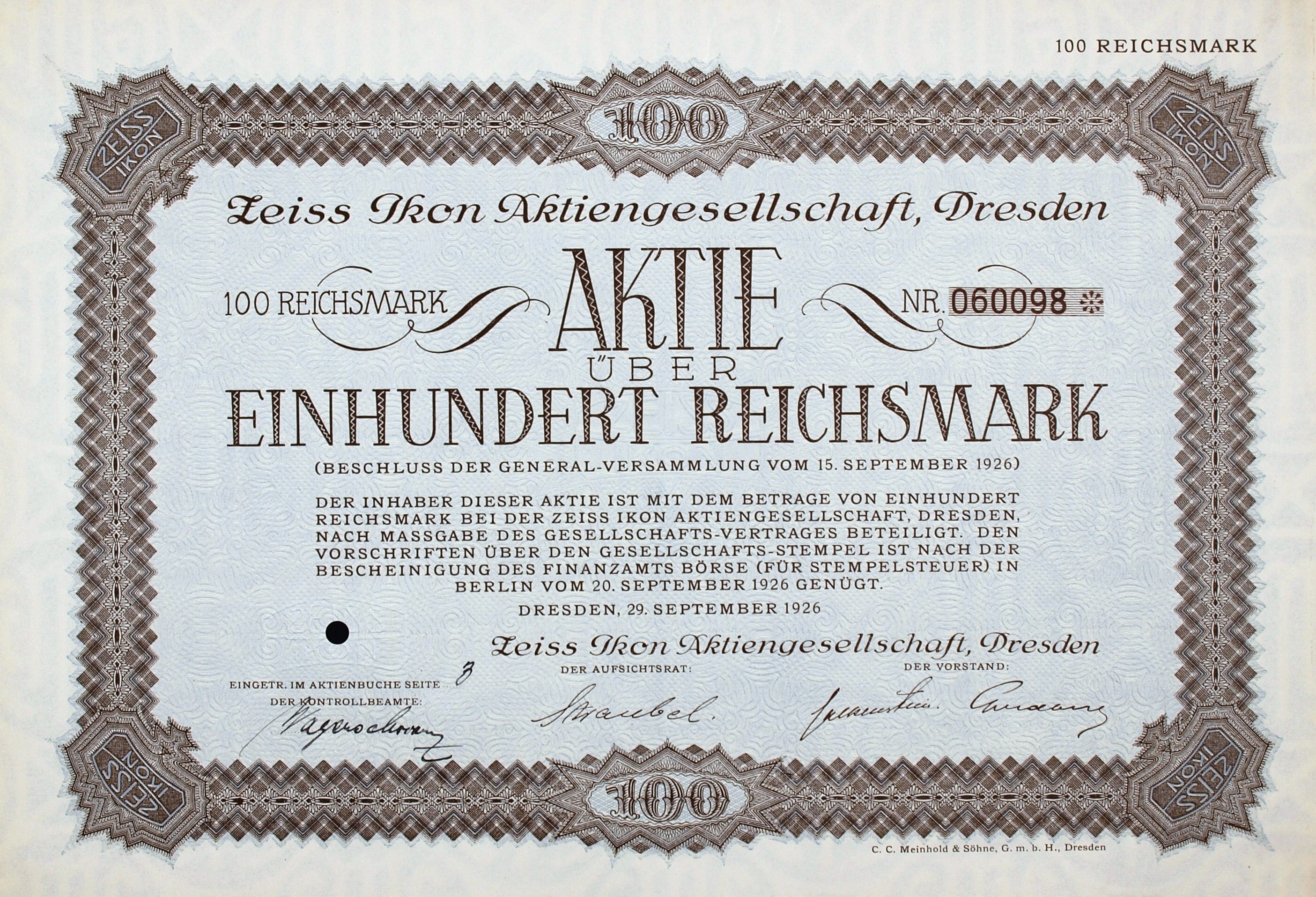 Altes deutsches Aktienzertifikat über 100 Reichsmark mit schwarzem Rand und gedrucktem Text.