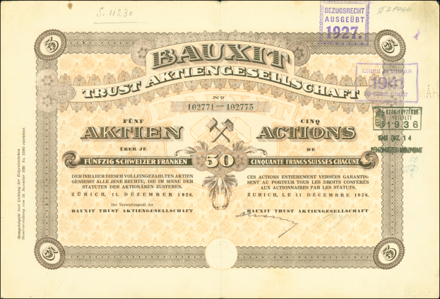 Ein altes deutsches Banknoten mit schwarzem Hintergrund, das das Porträt eines Mannes und den Text "Bauxit Trust Aktiengesellschaft" zeigt, mit einem Stempel auf der rechten Seite.