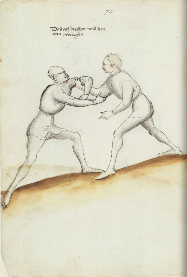 Zwei Männer stehen sich gegenüber, wobei einer einen Schlag austeilt, während er auf einem Papier mit sichtbarem Text steht.